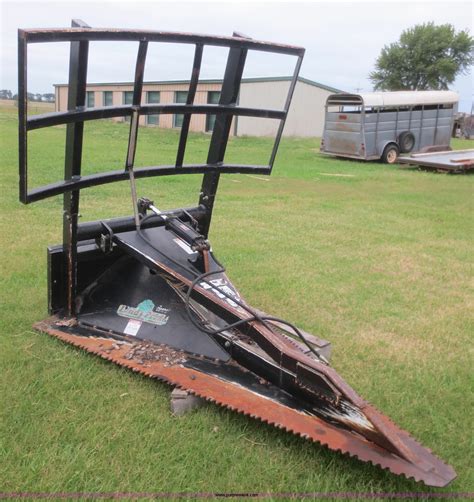 skid steer mounted tree saws